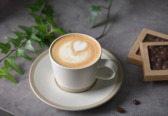 Morning aromatic invigorating coffee on a dark background