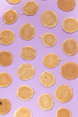 homemade cookies on purple background, creative food photography
