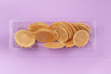 homemade cookies on purple background, creative food photography
