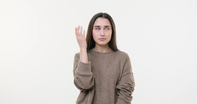 Unhappy woman shaking her head while regretting her deeds