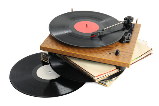 Vintage vinyl records and turntable on white background