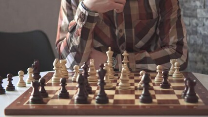 the chess player himself plays chess. Chess game for one. Table figures. Chess tournament for one player