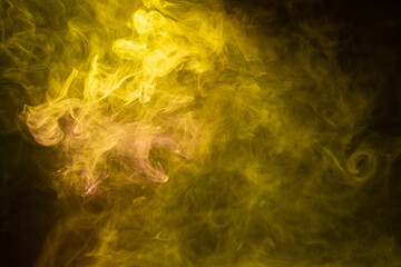 Yellow and pink steam on a black background.