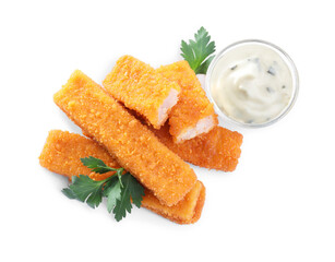 Fresh breaded fish fingers with parsley and sauce on white background, top view