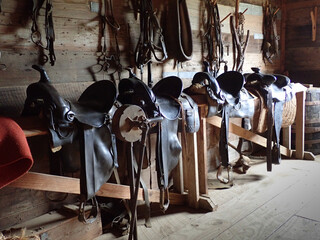Saddles in a barn