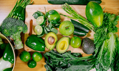 Healthy food clean eating selection: fruit, vegetable, seeds, superfood, leaf vegetable and mediterranean dishes. Detox and clean diet. Foods high in vitamins, minerals and antioxidants.