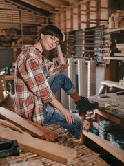 Girl woodworker in a country
