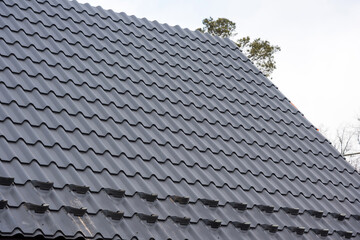 New metal roof construction. Building construction and renovation.