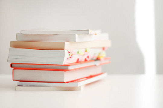 Colored books on a white background with a place for an inscription. Composition of books for reading. self-development books.