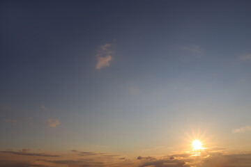 Fototapeta premium Picturesque view of beautiful blue sky with clouds at sunset