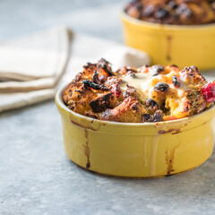 bread pudding on a  plate. Bread pudding made from bread covered with cream