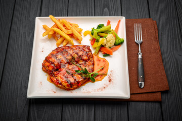 Grilled chicken breast steak with vegetables