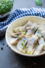 herring fish salty seafood appetizer portion on the table healthy meal top view copy space for text food background rustic image