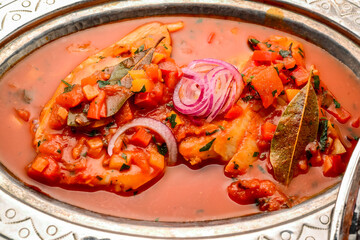 Chicken stew with mushrooms, tomatoes and various vegetables