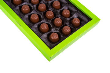 Chocolate sweets candy in green paper box isolated on the white background