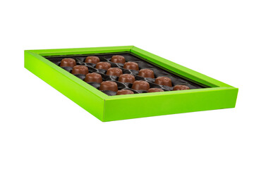 Chocolate sweets candy in green paper box isolated on the white background