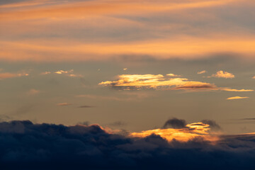Cloud formation in warm colors at dusk. Shot in Sweden, Scandinavia.