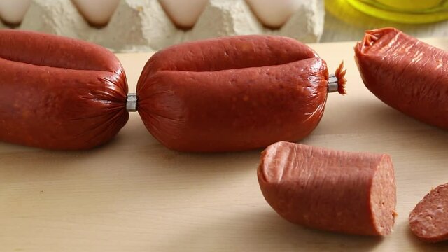 Slices of traditional Turkish halal sucuk, a dry, spicy and fermented sausage close up   
