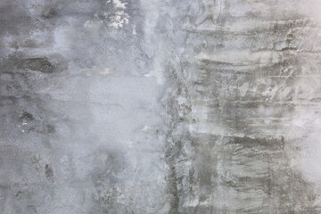 Loft style concrete wall background. Background or raw concrete surface for interior decoration. Selective focus