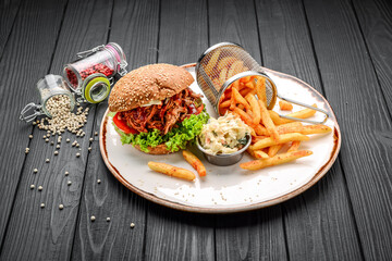 BBQ smoked pulled pork sandwich with pickles