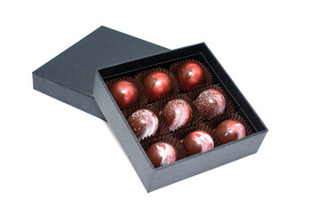 Chocolate candies in giftboxes isolated on white background. Assorted chocolates confectionery in their gift boxes. Set of colorful chocolate bonbons.