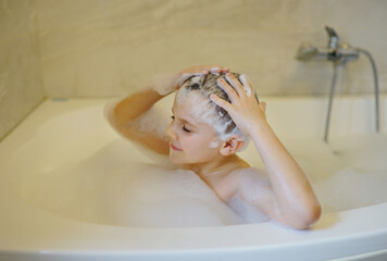 Naklejka premium child in bath