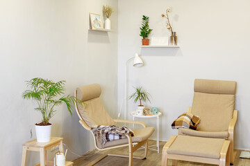 Apartment is in a Scandinavian style with armchairs. Lifestyle. Minimalism.