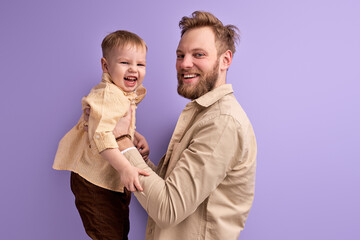 Handsome Caucasian Man Enjoy Spending Time With Son, In Casual Outfit