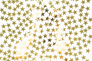 Christmas background with gold star confetti. Holiday background for New Year