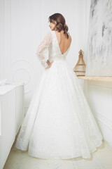 Naklejka premium portrait of beautiful blonde bride with fashion hairstyle and make-up