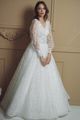 Fototapeta premium portrait of beautiful blonde bride with fashion hairstyle and make-up