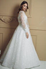 Fototapeta premium portrait of beautiful blonde bride with fashion hairstyle and make-up