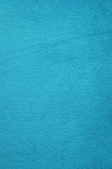 Turquoise suede material close-up. Textiles for furniture upholstery. The texture of the fabric.