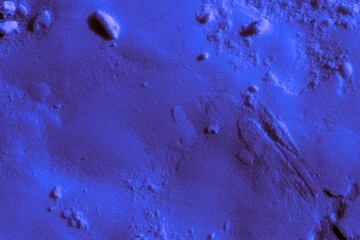 Bright purple, blue, light violet embossed glittering glow powder, sand, eye shadow with sparkles. Texture background