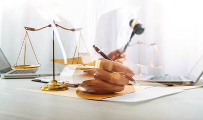 Business and lawyers discussing contract papers with brass scale on desk in office. Law, legal services, advice, justice and law concept picture with film grain effect