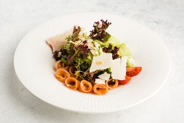 fresh salad of leaves, vegetables and salmon