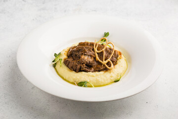 mashed potatoes with meat stew