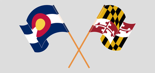 Crossed and waving flags of The State of Colorado and the State of Maryland