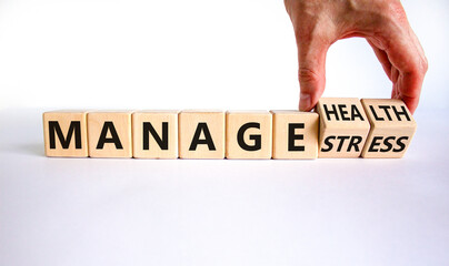 Manage stress and be health symbol. Doctor turns cubes and changes words 'manage stress' to 'manage health'. Beautiful white background. Psychological, business and manage stress concept. Copy space.