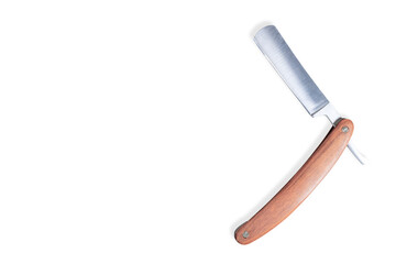 Straight metal razor with a wooden handle.