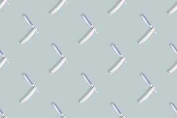 Straight razor seamless pattern. Background on the theme of a hairdressing salon.