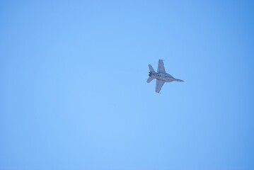 Air force fighter planes on display and doing aerial maneuvers