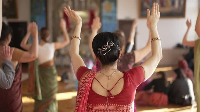 Hare Krishna women dancing at the temple