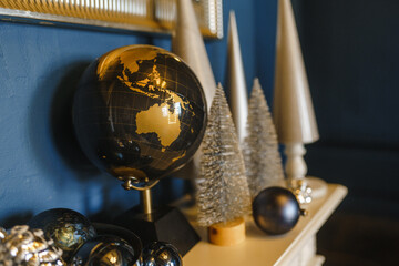 New Year, Christmas trees of paper, decoration of the fireplace, globe