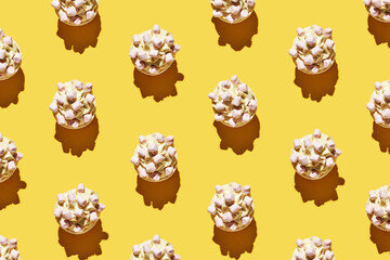 Milky cream cupcake. Birthday sweet bakery. Cookies. Yummy buttercream dessert. Wedding party food. Yellow background. Holiday recipe. Anniversary gourmet. Many different. Marshmallow. Trendy pattern