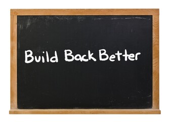 Obraz premium Build back better written in white chalk on a black chalkboard isolated on white