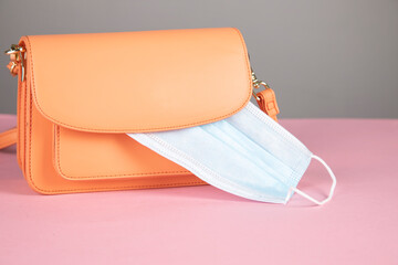 bag with medical mask on table