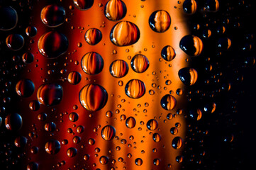 Raindrops with true dark red golden hour sunset.