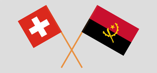 Crossed flags of Switzerland and Angola. Official colors. Correct proportion
