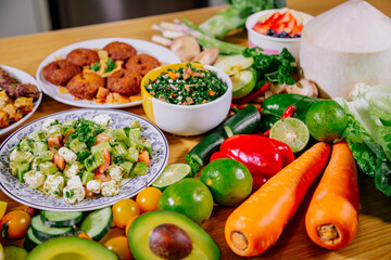 Healthy food clean eating selection: fruit, vegetable, seeds, superfood, leaf vegetable and mediterranean dishes. Detox and clean diet. Foods high in vitamins, minerals and antioxidants.